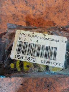 Тормозные колодки на Nissan Sunny B12 Фото 3