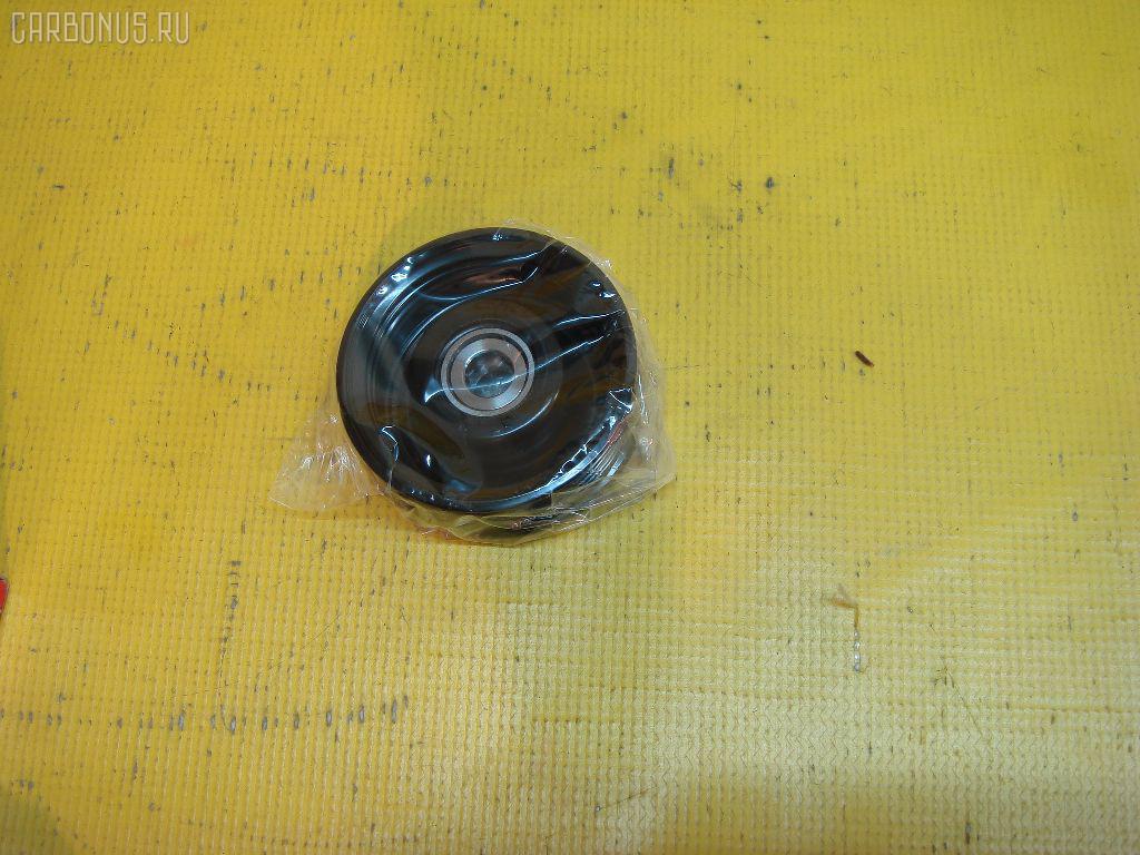 Ролик обводной TOYOTA 16604-50030, 13503-50011 на Toyota Land Cruiser UZJ100W 2UZFE Фото 2