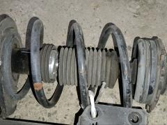 Стойка амортизатора на Nissan Leaf AZE0 EM57 Фото 7