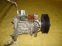 Компрессор кондиционера D570-61-K00 на Mazda Demio DY3W ZJ-VE Фото 2