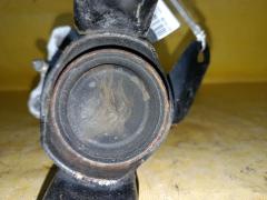 Подушка двигателя 12305-37050 на Toyota Voxy ZRR70G 3ZR-FAE Фото 3