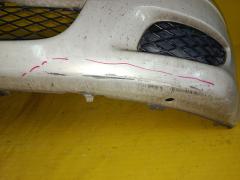 Бампер 52119-52180 на Toyota Vitz SCP13 Фото 7