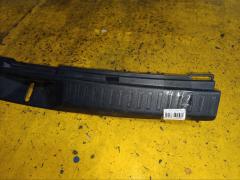 Обшивка багажника 64716-13140 на Toyota Corolla Fielder NZE141G Фото 2