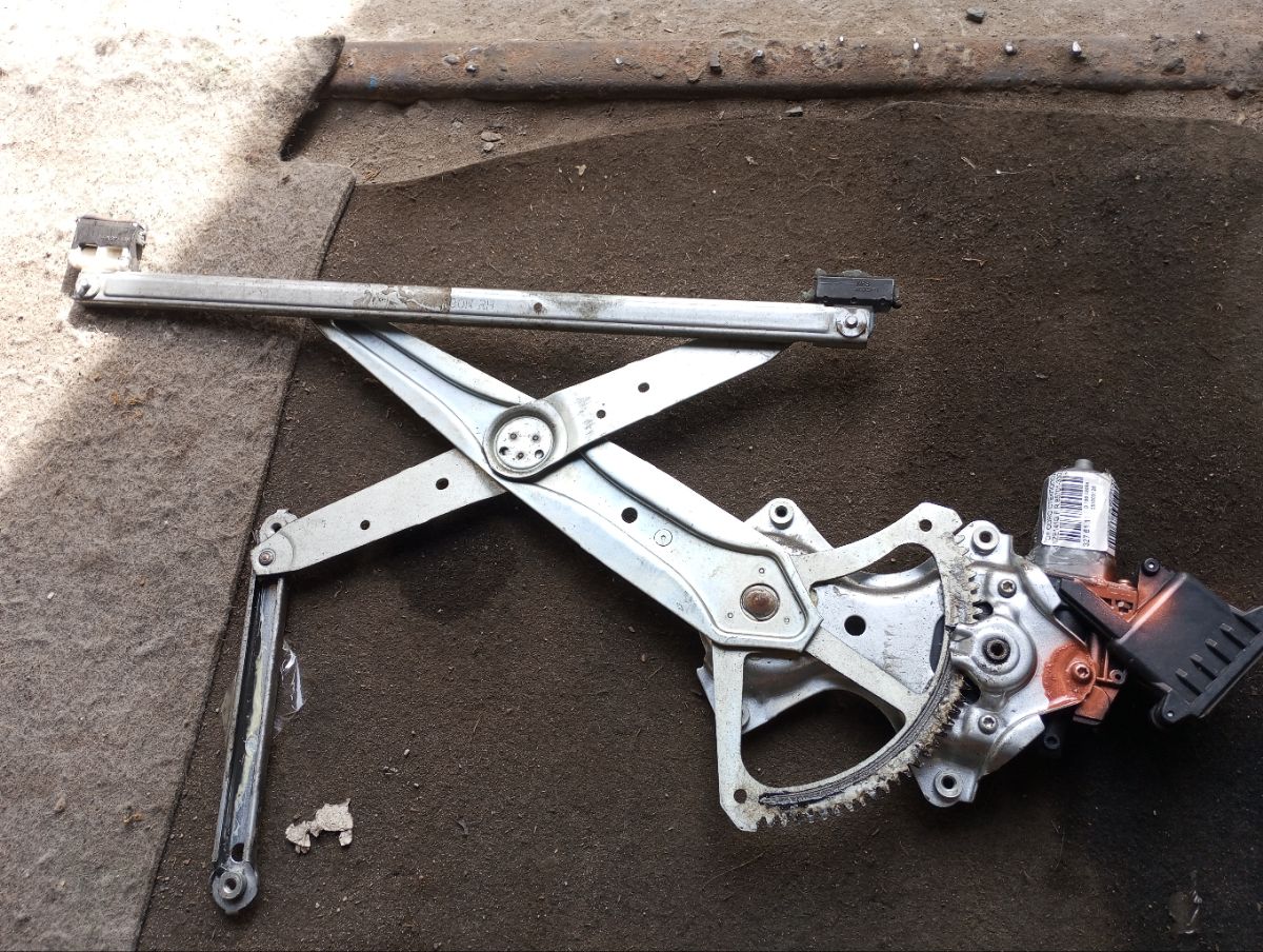 Стеклоподъемный механизм 85701-33010 на Toyota Corolla Fielder NZE141G Фото 6