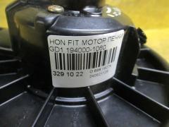 Мотор печки 194000-1060, 79310-SAA-003 на Honda Fit GD1 Фото 2