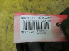 Стойка амортизатора на Nissan Note E12 HR12DDR Фото 2