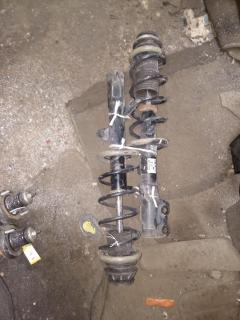 Стойка амортизатора на Nissan Note E12 HR12DDR Фото 2