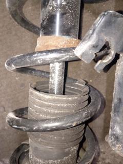 Стойка амортизатора на Nissan Note E12 HR12DDR Фото 5