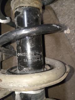 Стойка амортизатора на Nissan Note E12 HR12DDR Фото 6