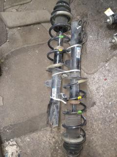 Стойка амортизатора на Nissan Note E12 HR12DDR Фото 7