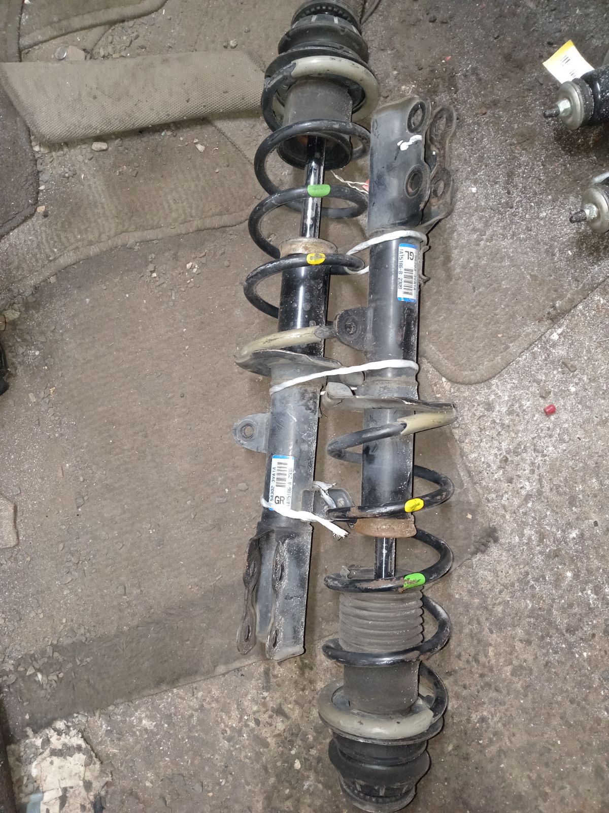 Стойка амортизатора на Nissan Note E12 HR12DDR Фото 7