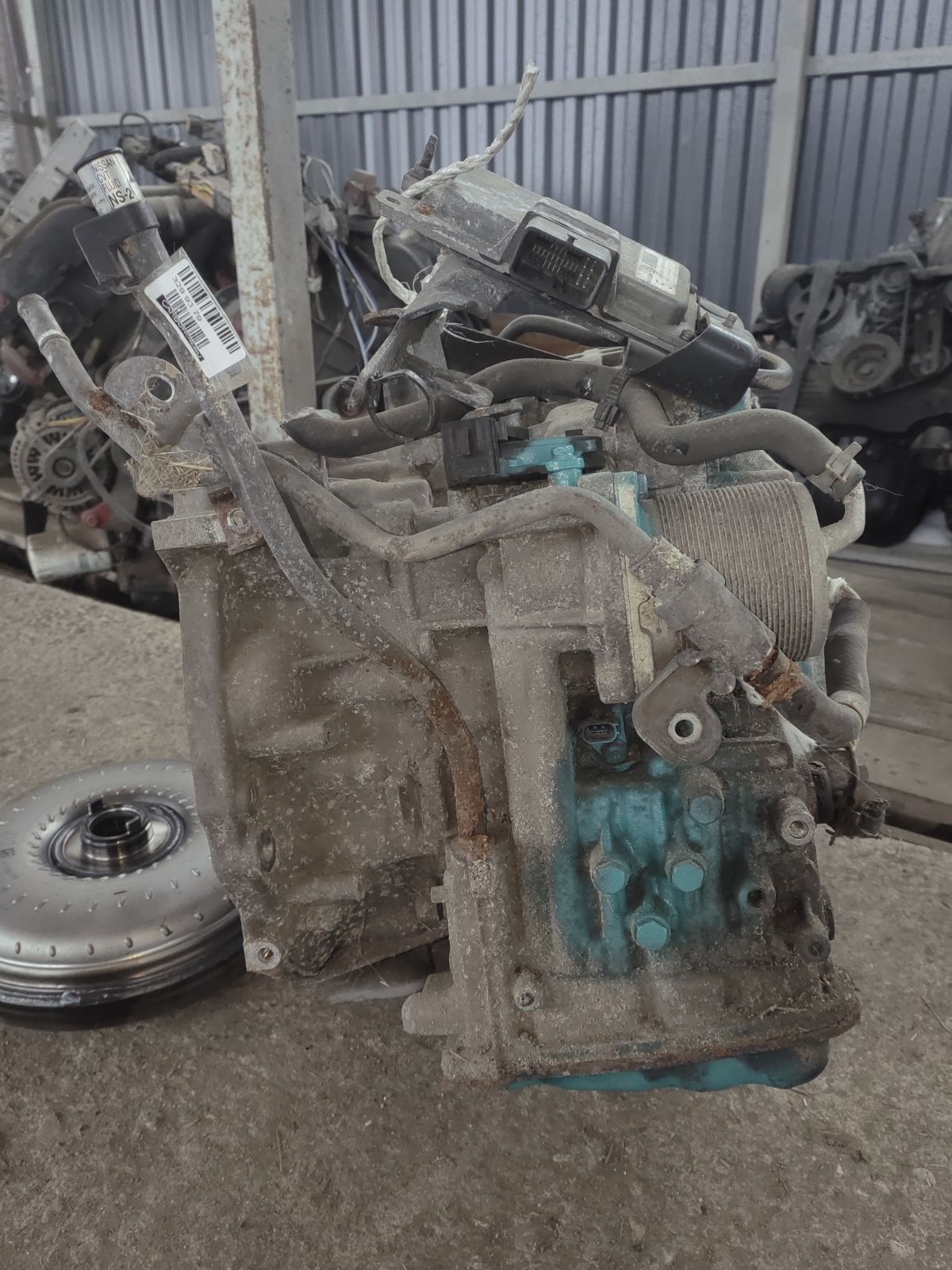 КПП автоматическая 310201XT1B на Nissan X-Trail NT31 MR20DE Фото 9