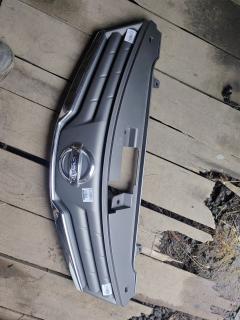 Решетка радиатора 62310-8Y20A на Nissan Note E11 Фото 4