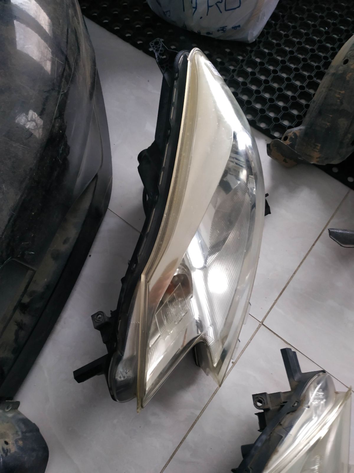 Фара 1868 1868 на Nissan Note E12 Фото 18