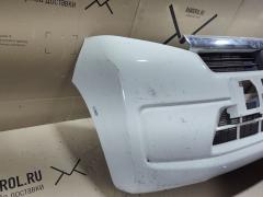 Бампер на Daihatsu Move LA100S Фото 3