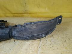 Подкрылок 63843-3VA0A на Nissan Note E12 HR12DE Фото 4
