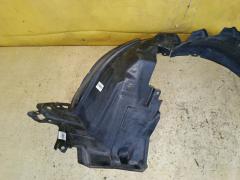 Подкрылок 63842-3VA0A на Nissan Note E12 HR12DE Фото 2