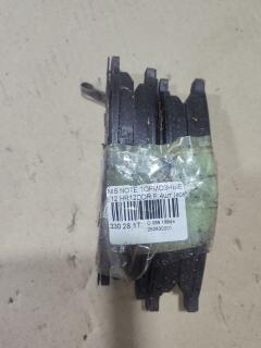 Тормозные колодки на Nissan Note E12 HR12DDR Фото 1