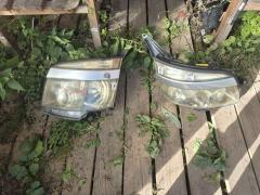Фара 28-203 28-203 на Toyota Voxy ZRR75G Фото 9