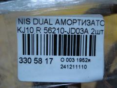 Амортизатор 56210-JD03A на Nissan Dualis KJ10 Фото 4