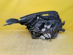 Фара 28-203 28-203 на Toyota Voxy ZRR70G Фото 2