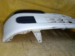 Бампер 52119-97409 на Daihatsu Storia M100S Фото 8