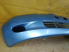 Бампер 52119-52410 на Toyota Vitz KSP90 Фото 6