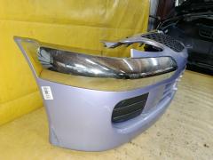 Бампер 52119-97409 на Toyota Duet M100A Фото 3