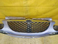 Бампер 52119-97409 на Toyota Duet M100A Фото 4