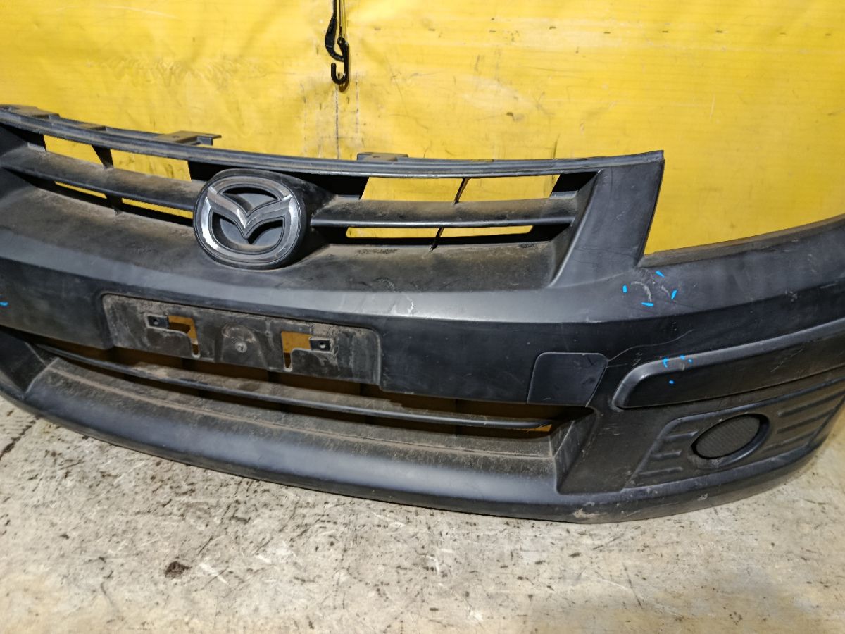 Бампер 6022-JJ10H на Mazda Familia Van VY12 Фото 4