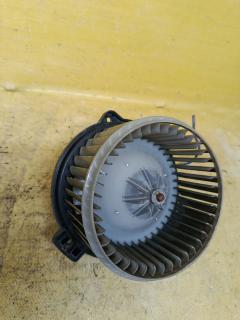 Мотор печки 87103-12050 на Toyota Allion AZT240 Фото 2