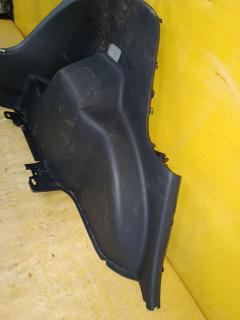 Обшивка багажника 64715-52280 на Toyota Vitz SCP90 Фото 3