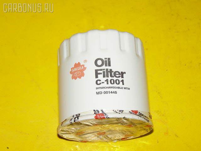 Фильтр масляный SAKURA C-1001, 15208 HC254, 15208 HC256, 15208 HC300, 15208AA030, 15208AA031, 15400-PCX-004, 15400-PR3-000, 15400-PR3-003, 15400-PR3-004, 15400-PR3-014, 15400-PR3-305, 15400-PR3-315, 15400-PR3-405, 15400-PR3-408, 15400-PR3-415, 5-86000-179-0, 5-86000-180-0, 5-86008-290-0, 8-94149-418-0, 8-94243-502-1, 8-94251-110-0, 8-94430-411-0, 8-94430-411-1, 8-94456-741-0, 8-94456-741-1, 8-94456-741-2, AY100-FJ022, AY100-HN022, C-1003, C-1024, C-1605, C-307, H1540-PR3-408, MD001445, MD001450, MD005450, MD007095, MD069982, MD097003, MD136790, MD325714, MD352626, MQ900508, MQ907308, MQ909710, MZ690150, N3Y6-14-302, RF2A-14-302A, RF79-14-302, RFY2-14-302, RFY5-14-302, RFY6-14-302, ZA8-94456-741-2 Фото 1