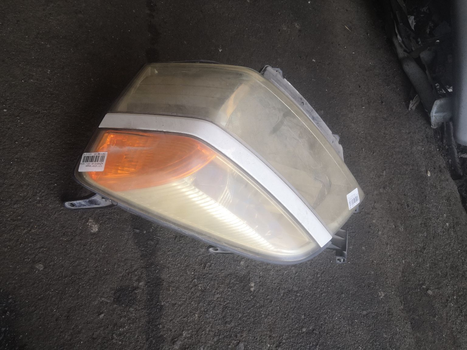 Фара 28-153 28-153 на Toyota Voxy AZR60G Фото 3