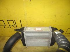 Радиатор интеркулера 14461-3HD0C на Nissan Note E12 HR12DDR Фото 2