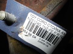 Стойка амортизатора на Toyota Corolla Fielder NZE124G 1NZ-FE Фото 15