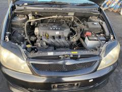 Кожух ДВС 11212-21010-B1 на Toyota Corolla Fielder NZE121G 1NZ-FE Фото 4