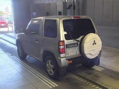 Блок управления air bag MR587132 на Mitsubishi Pajero Mini H58A 4A30T Фото 3