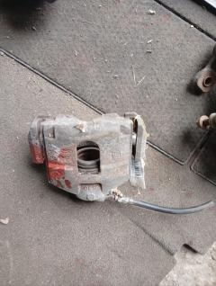 Суппорт D3Y0-33-98Z, D3Y0-33-98ZA, D3Y0-33-98ZB на Mazda Demio DY3W ZJ-VE Фото 4