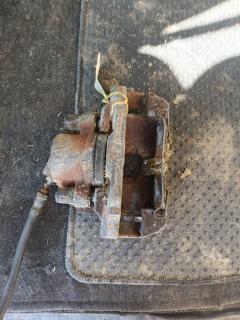 Суппорт D3Y0-33-99Z, D3Y0-33-99ZA, D3Y0-33-99ZB на Mazda Demio DY3W ZJ-VE Фото 6