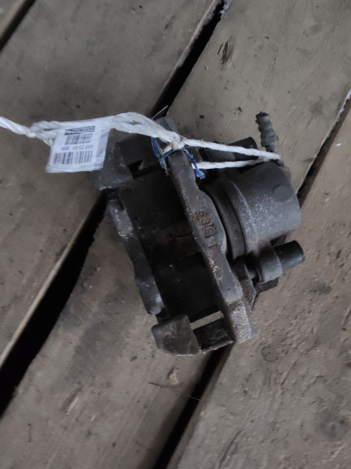 Суппорт D3Y0-33-99Z, D3Y0-33-99ZA, D3Y0-33-99ZB на Mazda Verisa DC5W ZY-VE Фото 3