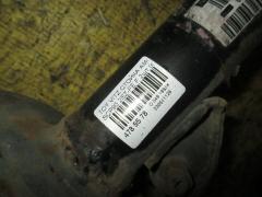 Стойка амортизатора на Toyota Vitz SCP90 2SZ-FE Фото 2