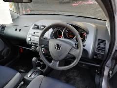 Ремень безопасности на Honda Fit GD1 L13A Фото 6