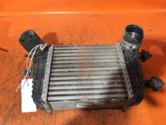 Радиатор интеркулера на Nissan Note E12 HR12DDR Фото 1