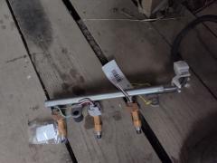 Форсунка инжекторная 23209-49085 на Toyota Passo KGC30 1KRFE Фото 3