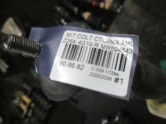 Стойка амортизатора MR594543 на Mitsubishi Colt Z26A 4G19 Фото 3