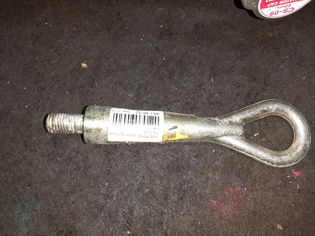 Крюк буксировочный 51112AU000, 51112AU00A на Nissan Primera TP12 Фото 3