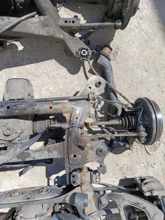Балка подвески 51206-12100 на Toyota Corolla Fielder NZE144G 1NZ-FE Фото 2