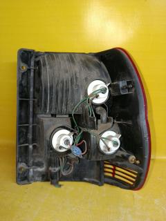 Стоп 1146-330 на Mitsubishi Pajero Io H66W Фото 7