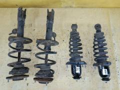 Стойка амортизатора на Toyota Corolla Fielder ZRE144G 2ZR-FE
